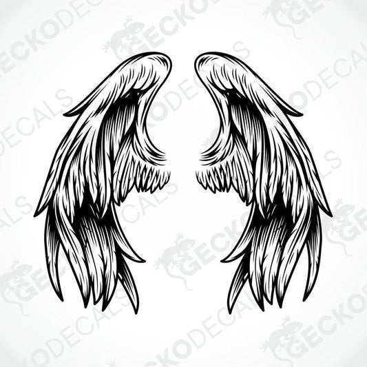 A pair of black and white angel wings decals on a white background.