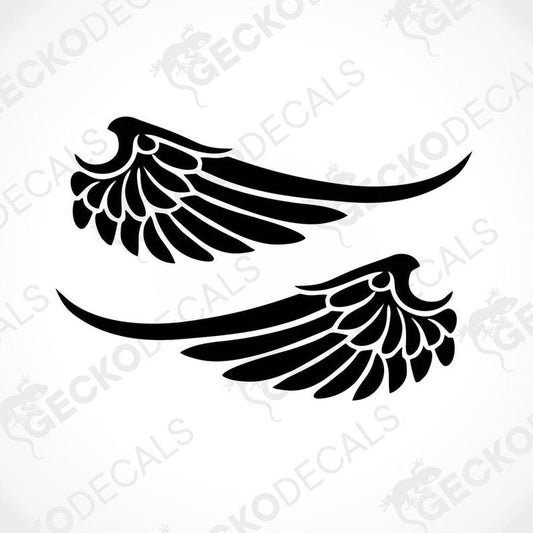 Two black die cut decals of wing shapes on a white background.