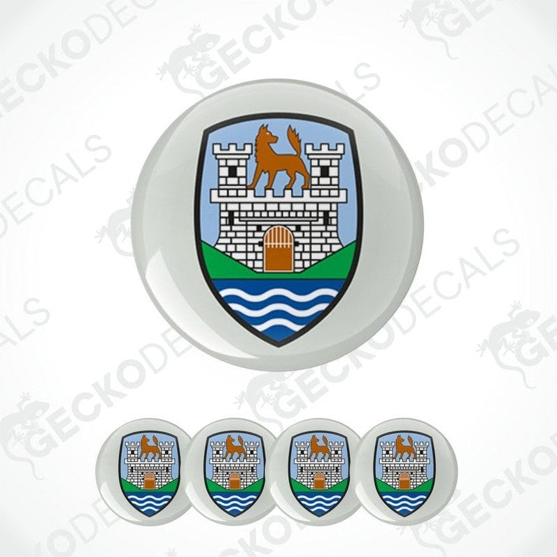 Set of car emblems with a castle and lion design on a white background.