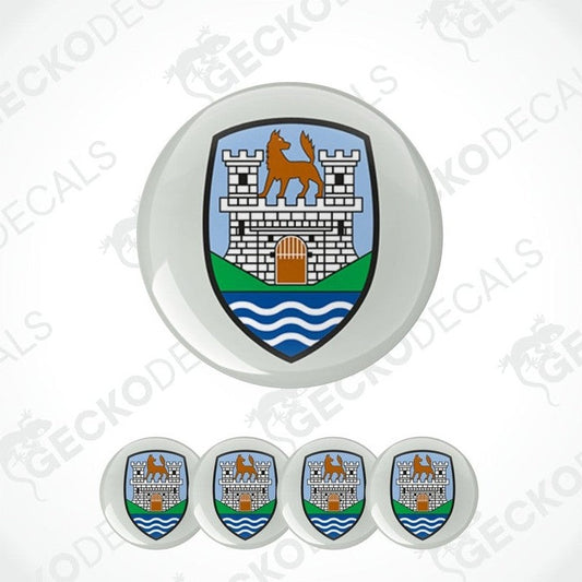 Set of car emblems with a castle and lion design on a white background.