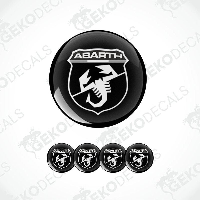 A set of black and white vinyl decals with the Abarth logo, designed for use on vehicles.