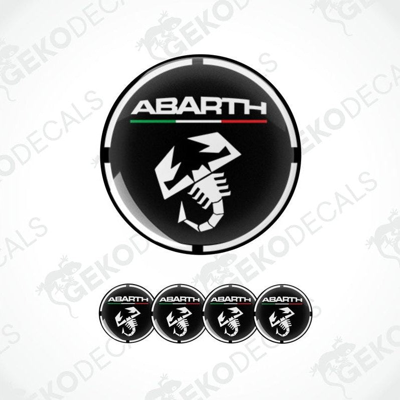 A set of four round vinyl stickers with a black, red, white, and green geometric design featuring the word 'ABARTH' in bold letters.
