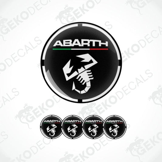 A set of four round vinyl stickers with a black, red, white, and green geometric design featuring the word 'ABARTH' in bold letters.
