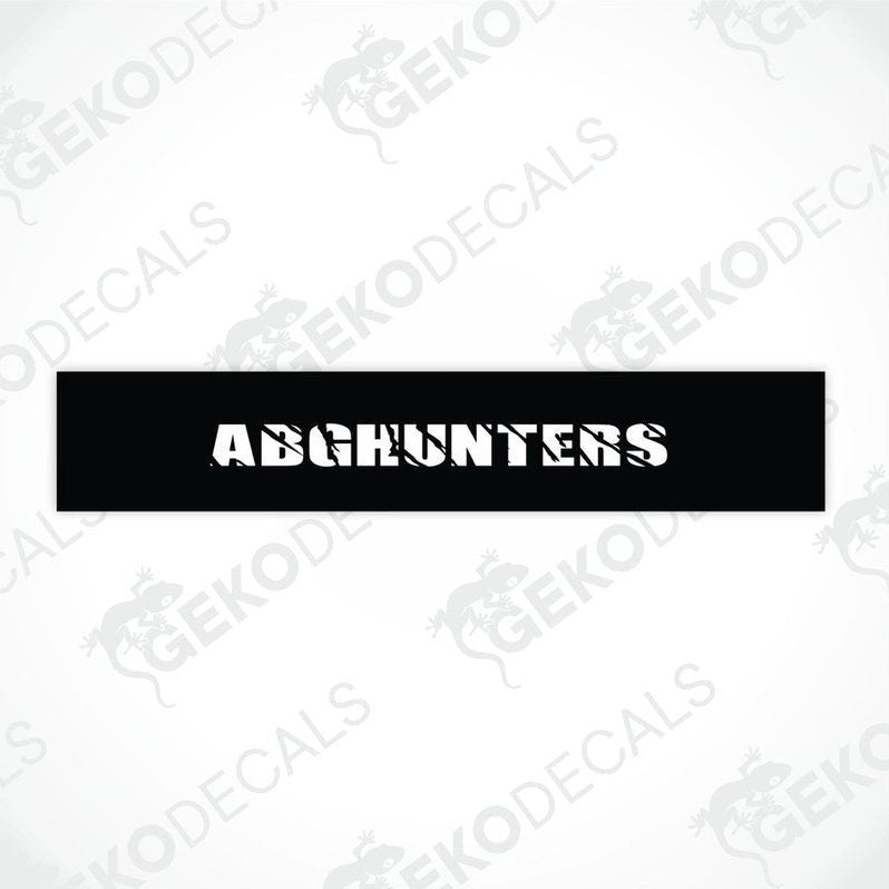 Black car windshield sun visor with white text ABGHUNTERS