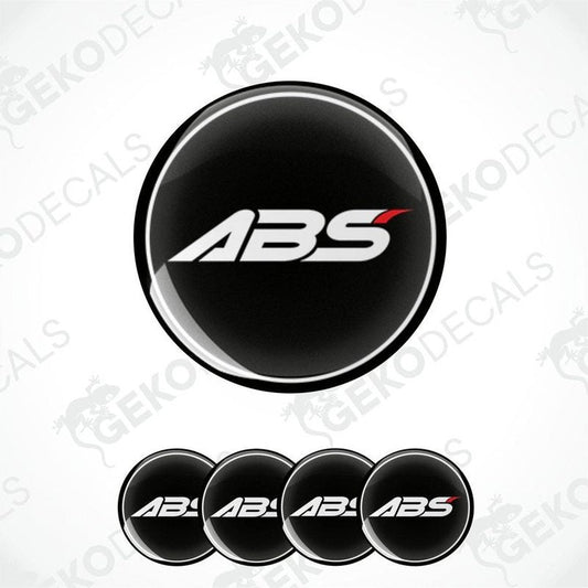 A set of four black vinyl stickers with the ABS logo printed on them.