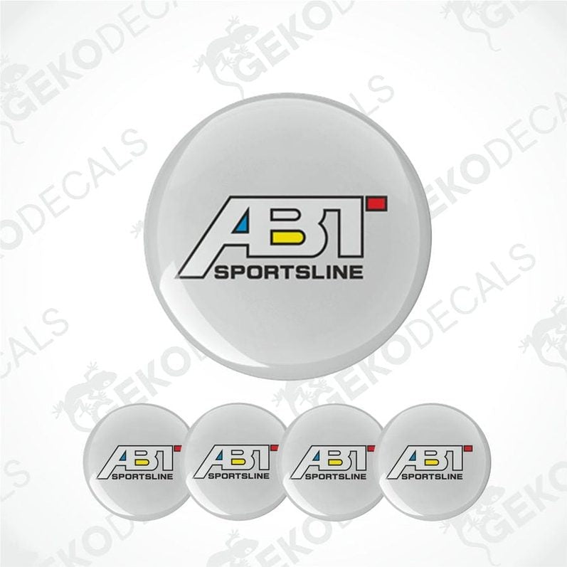 A set of round car decals with the ABT Sportsline logo in white, red, and yellow colors.