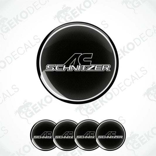 A set of four black and silver AC Schnizer vinyl decals with a polyurethane coating, designed for use as car wheel decals.
