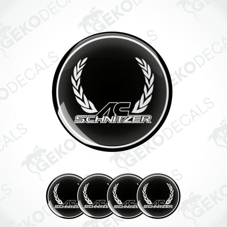 Set of four black and white vinyl decals with the AC SCHNIZER logo and a laurel wreath.