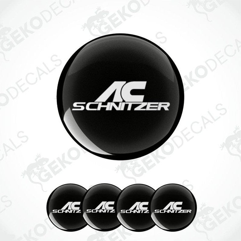 A set of four black vinyl stickers with 'AC SCHNIZER' branding in white.