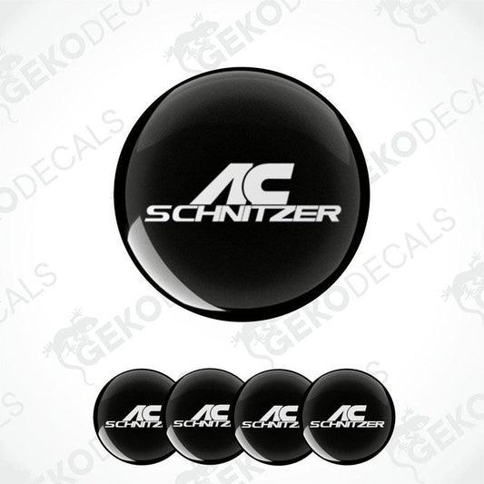 A set of four black vinyl stickers with 'AC SCHNIZER' branding in white.