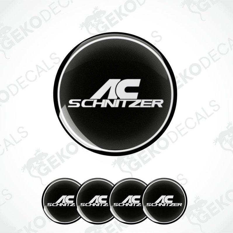 A set of four black vinyl stickers with the text 'AC SCHNIZER' in white.