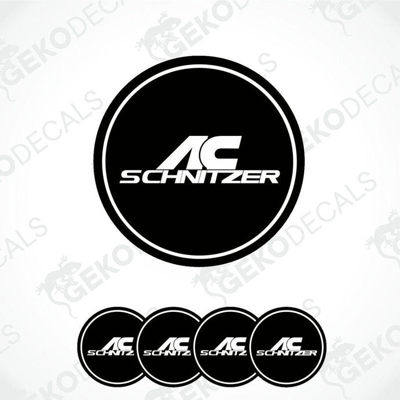 A set of four black vinyl stickers with the text 'AC SCHNIZER' in white.