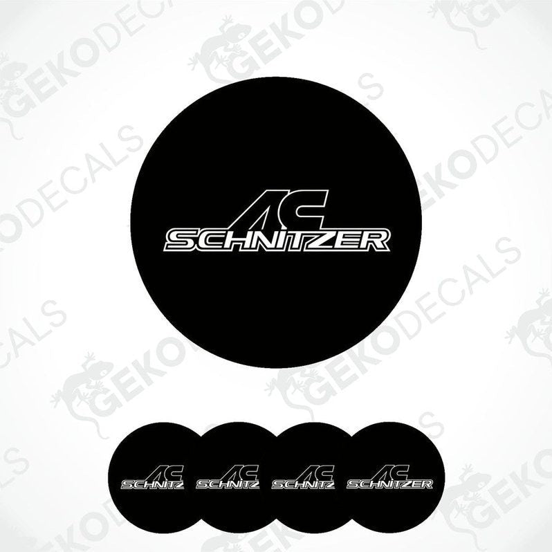 Set of four black vinyl decals with the 'AC Schnizer' logo in white, designed for use on car wheel caps.