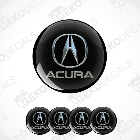 A set of four black vinyl stickers with the ACURA logo printed on them.