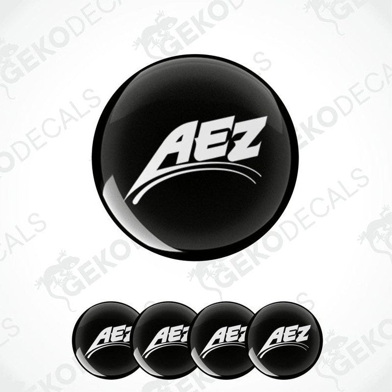 A set of four black vinyl stickers with the AEZ brand logo and text