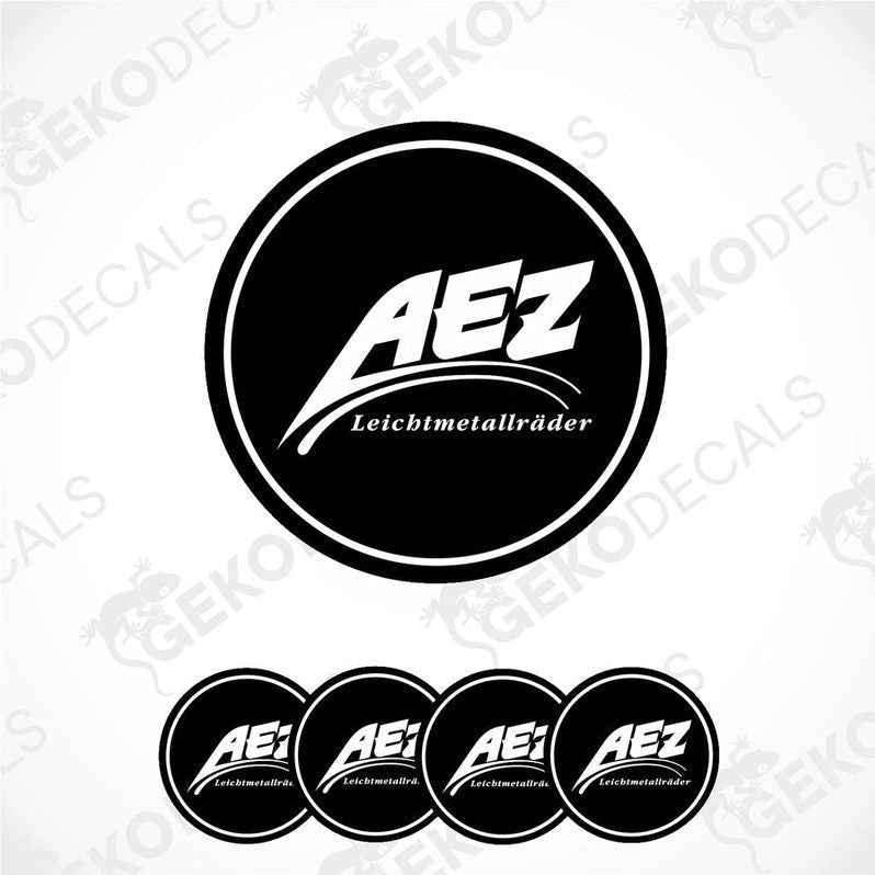 A set of four black and white vinyl decals with the AEZ LEICHTMETALLRÄDER logo.