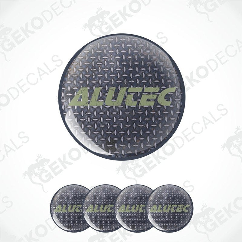 A set of four black round vinyl stickers with the text 'ALUTEC' and a geometric pattern in the background.