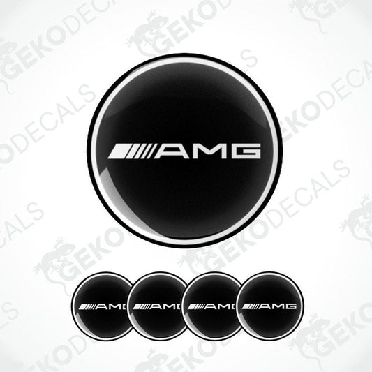 A set of four black vinyl stickers with the AMG logo, designed for use on car wheels.