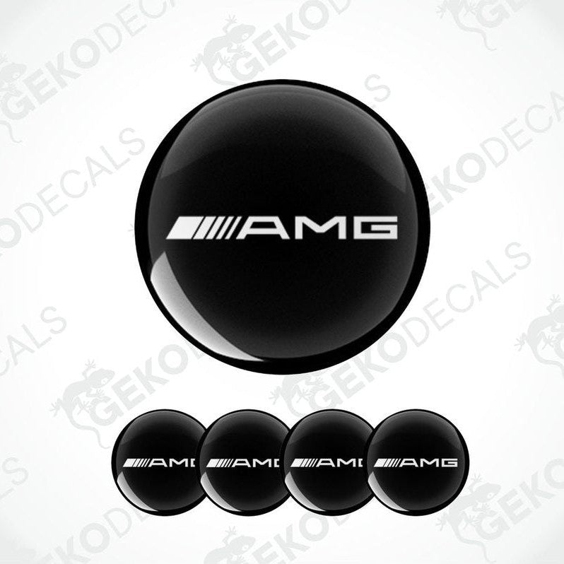 A set of four black vinyl decals with the AMG logo.