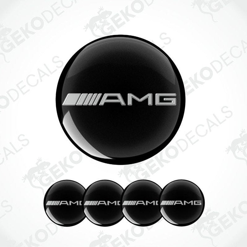 A set of four black and grey vinyl decals with the AMG logo.