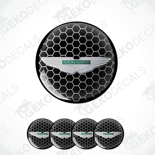A set of four black vinyl stickers with the Aston Martin logo in the center.