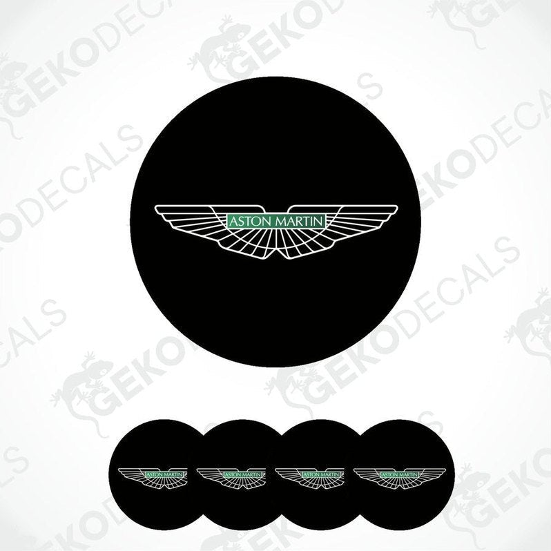 A set of vinyl decals with the Aston Martin logo applied on a black surface and shown in isolation against a white background.