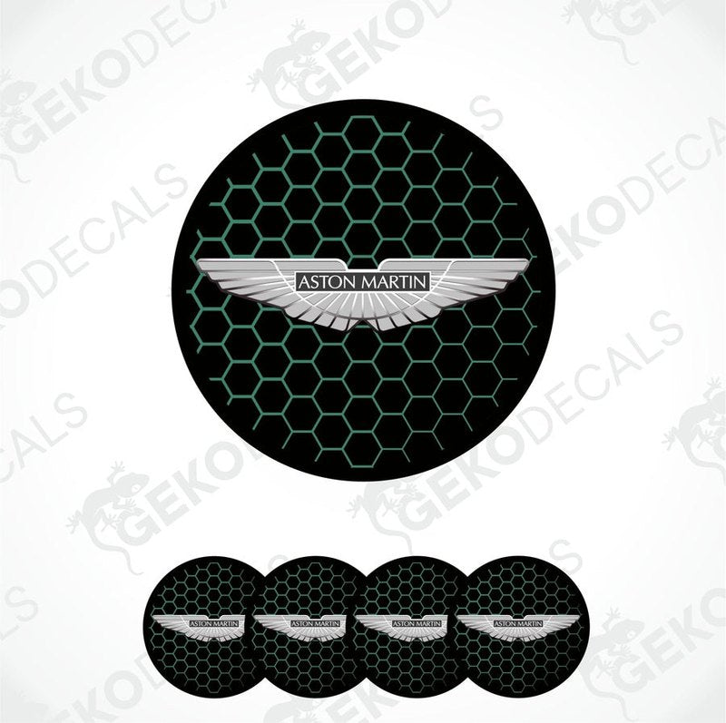 A set of four black vinyl stickers with a green pattern and the Aston Martin logo in the center.