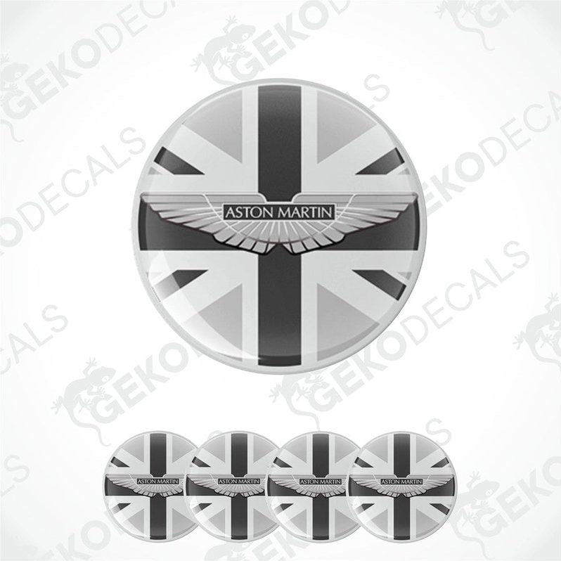 A set of vinyl stickers with a geometric pattern, including a central sticker with the Aston Martin logo, and smaller ones around it.