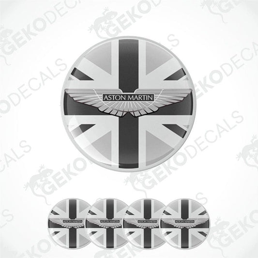 A set of vinyl stickers with a geometric pattern, including a central sticker with the Aston Martin logo, and smaller ones around it.