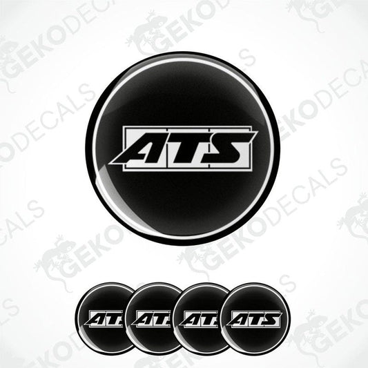 A set of four round black vinyl stickers with the ATS logo in white.