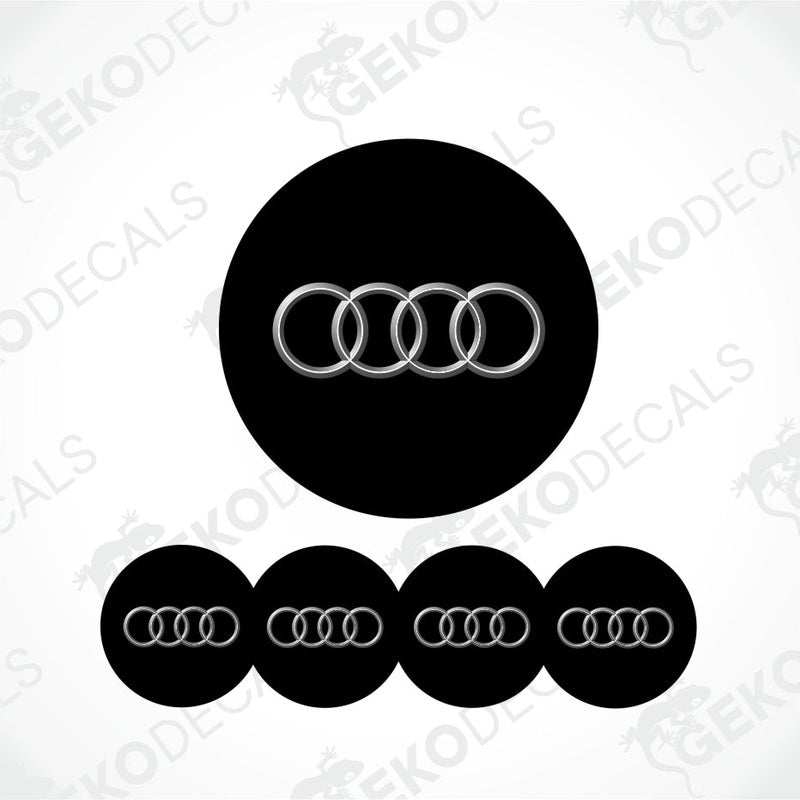Set of vinyl decals with the Audi logo applied on a black background, intended for use as car stickers.