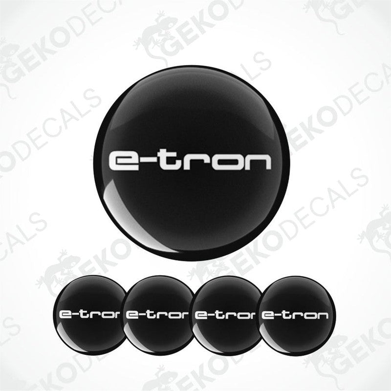 Set of four black vinyl decals with 'e-tron' branding, four are round and one is rectangular