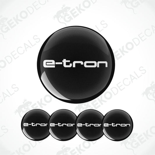 Set of four black vinyl decals with 'e-tron' branding, four are round and one is rectangular