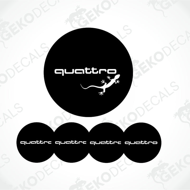 A set of four black vinyl stickers with the word 'AUDI QUATTRO' and an image of a lizard. 