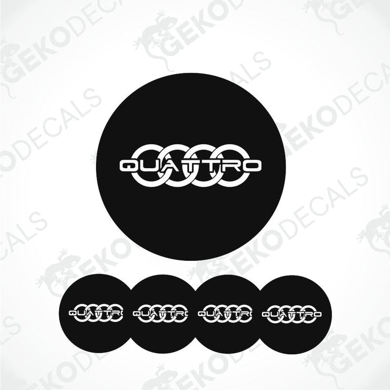 A set of four black vinyl stickers with the word 'QUATTRO' embossed on them, presented on a white background.