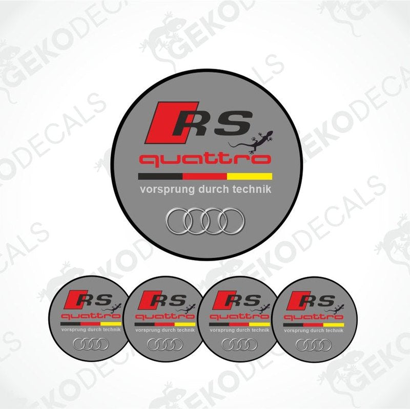 A set of four circular car decals with a 'RS quattro' design, predominantly gray with red and yellow accents, and the Audi logo.