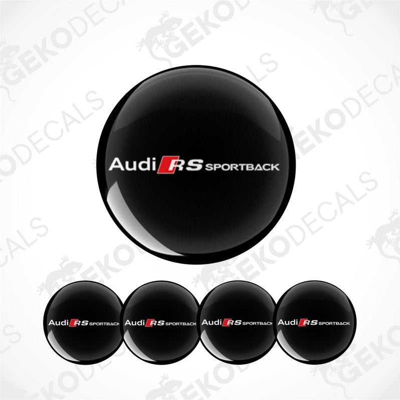A set of four black vinyl stickers with the text 'AUDI RS SPORTBACK' and a logo depicting an RS Sportback vehicle.