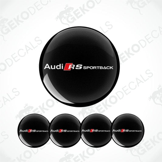 A set of four black vinyl stickers with the text 'AUDI RS SPORTBACK' and a logo depicting an RS Sportback vehicle.