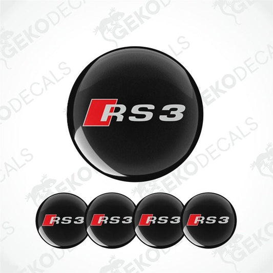 A set of four black vinyl stickers with the Audi RS3 logo in red and white.