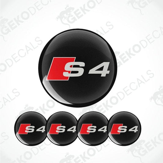 A set of four black vinyl stickers with a red 'AUDI S4' logo for car decals.
