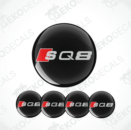 A set of four black vinyl stickers with the Audi SQ8 logo in red and white.