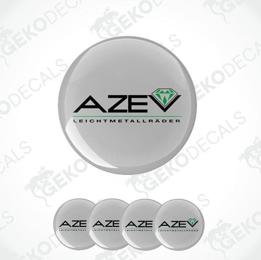 A set of four grey vinyl stickers with the AZEV brand logo and text, designed for car decals.