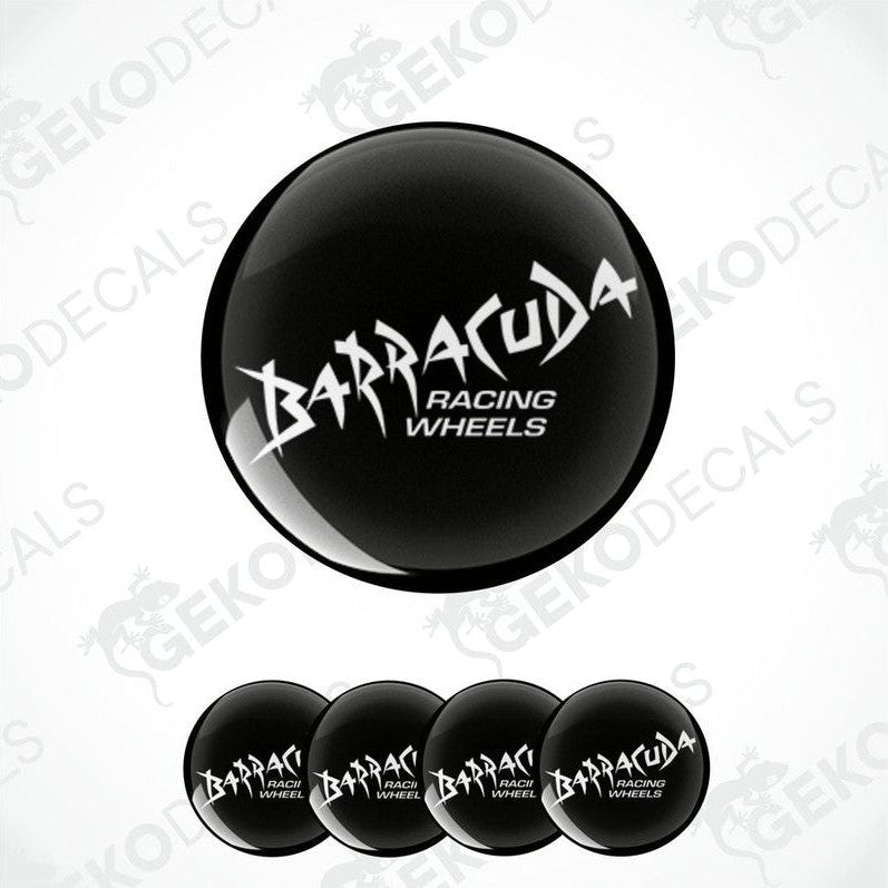 A set of four black vinyl stickers with the white text 'BARRACUDA RACING WHEELS' on them.