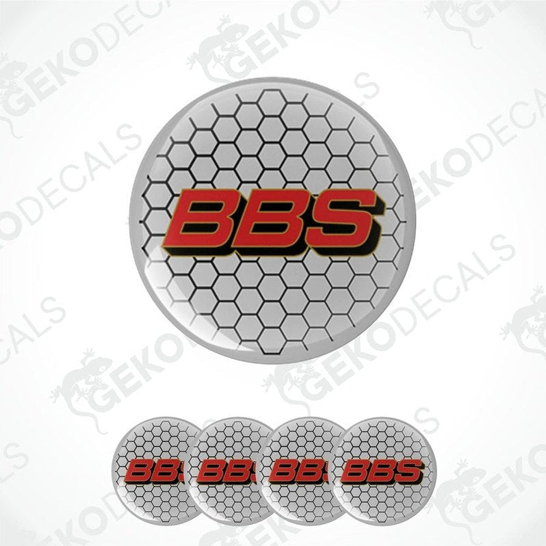 A set of four round car decals with a honeycomb pattern and the letters 'BBS' in the center.