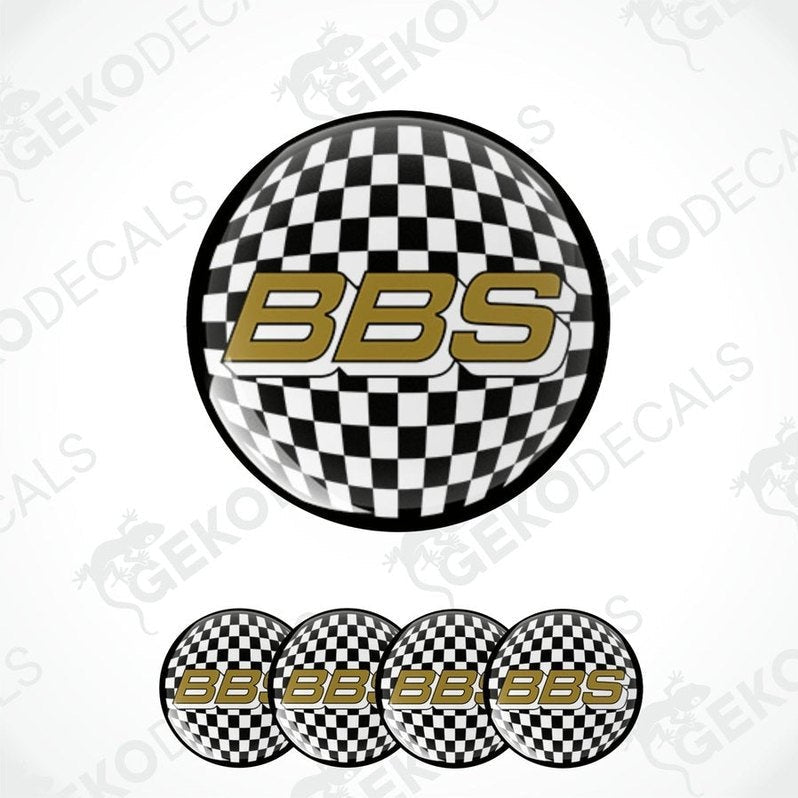A set of four vinyl decals with a polyurethane coating featuring a checkered black and white design and the letters 'BBS' in gold.