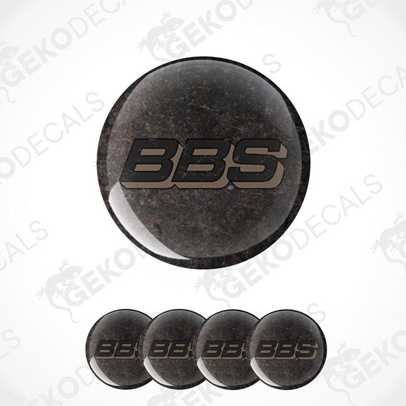 A set of four black vinyl stickers with the BBS logo printed on them.