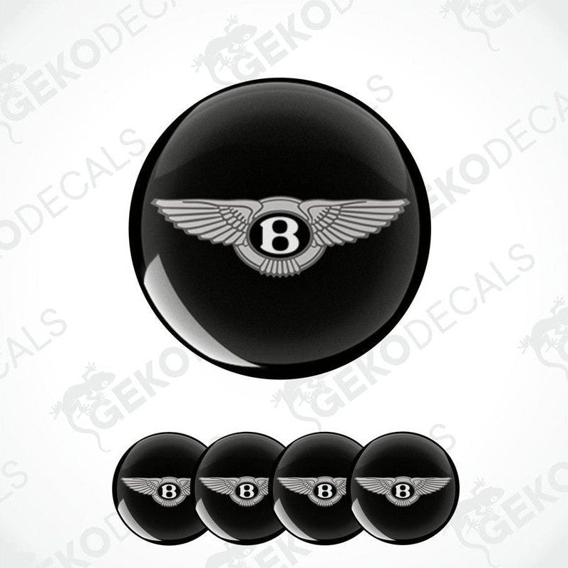 A set of black vinyl decals with a silver Bentley logo, intended for use on a vehicle's wheels.
