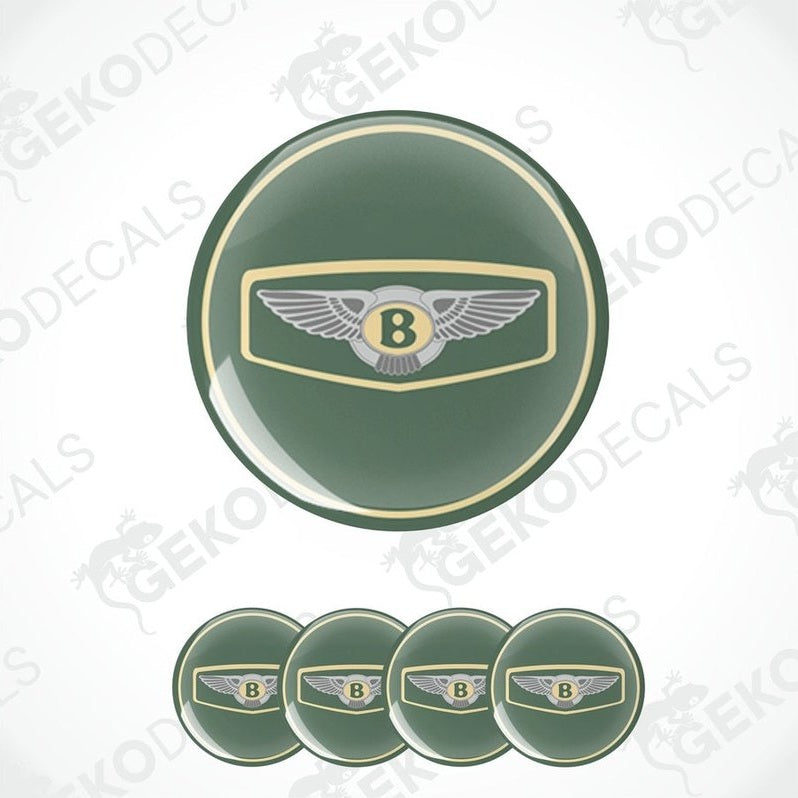 A set of four green vinyl stickers with a gold and silver Bentley logo design.