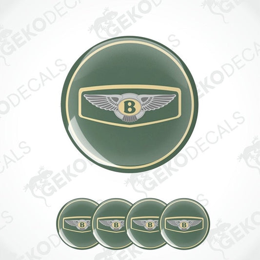 A set of four green vinyl stickers with a gold and silver Bentley logo design.