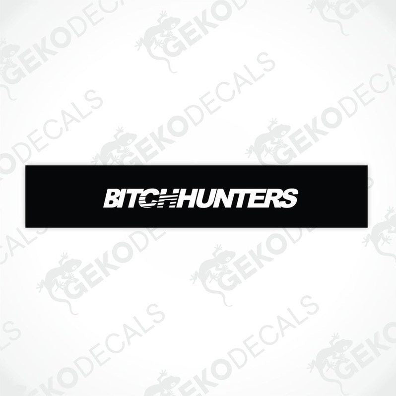 Black car windshield sun visor with white text BITCHHUNTERS